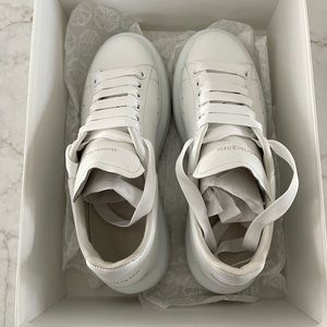 Alexander McQueen leather exaggerated-sole sneakers.